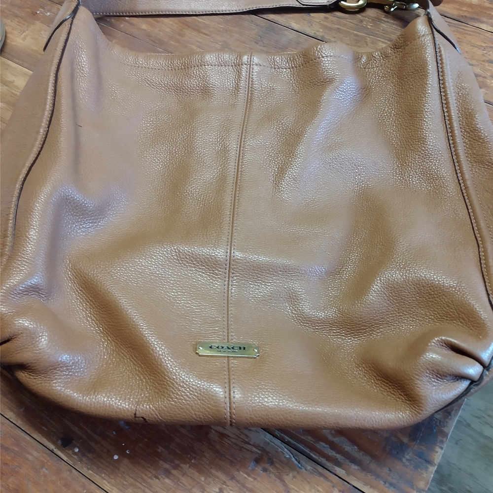 Tan leather Coach purse